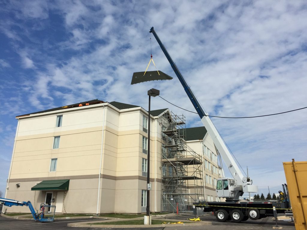 roof struction demolition craned piece